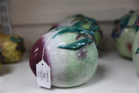 A pair of Chinese enamelled porcelain models of peaches, 19th century, 16cm